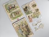 trois puzzles posés sur la table, sur lesquels figurent des images de personnes