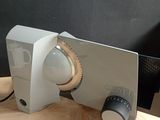 a computer monitor sitting on top of a wooden desk