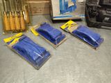 four bags of blue plastic items on a table