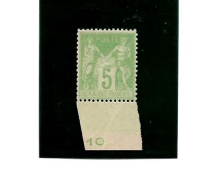 un timbre vert et blanc sur lequel figure l'image d'une femme