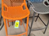 two chairs that are sitting next to each other