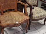 two chairs that are sitting next to each other on the floor
