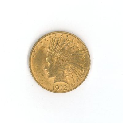 une pièce d'or sur laquelle est représentée une tête d'Indien