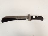 a knife that is laying on a white surface