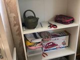 a shelf that has a bunch of items on it