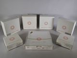 several boxes of different sizes and shapes are sitting on a table