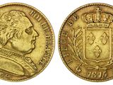 une pièce souveraine en or surmontée d'une couronne