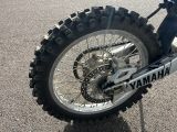 a close up view of a motorcycle tire on the ground