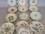 a lot of plates that are sitting on a table