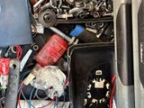 a pile of assorted items in the back of a truck