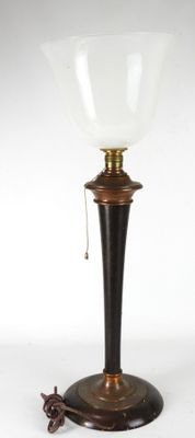 an image of a lamp with a glass shade on top of it