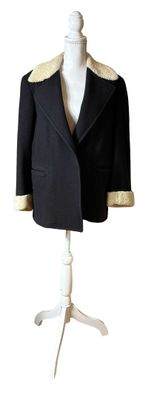 jacket on a mannequin stand on a white mannequin