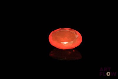 an image of a candle that is glowing in the dark