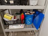a shelf that has a lot of items in it