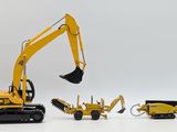 a yellow toy excavator and two other toy vehicles