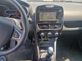 a dashboard of a car with a steering wheel and dashboard controls