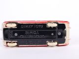 a close up of a small red and black device