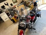 a motorcycle that is parked inside of a building