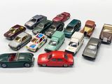 a lot of toy cars that are sitting on a table