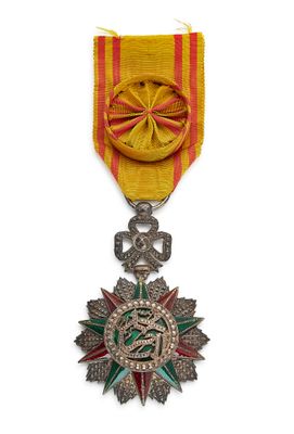 l'image d'une médaille surmontée d'une étoile