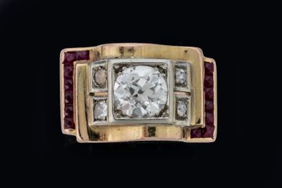 une image représentant une bague sertie d'un diamant et d'un rubis sur fond noir