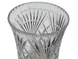 a glass vase that has a pattern on it