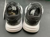a close up of a pair of shoes on a table