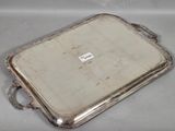 silver plated serving tray with handles and handles on a table