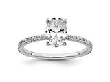an oval cut diamond engagement ring with pave set shoulders