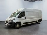 an image of a white van in a white room