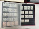 a lot of stamps and a book on the table
