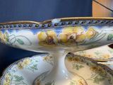 a bowl and plate on a table with a blue background