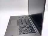 a laptop computer that is sitting on a table