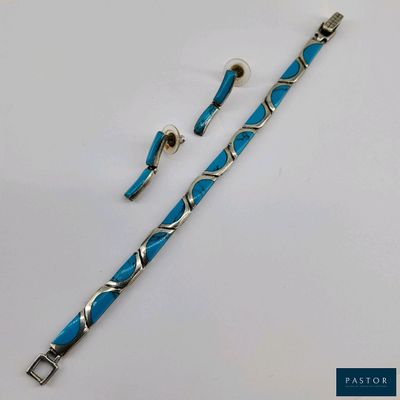 Ensemble bracelet et paire de boucles d'oreilles en argent (…