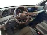 a picture of the interior of a car with a steering wheel and dashboard