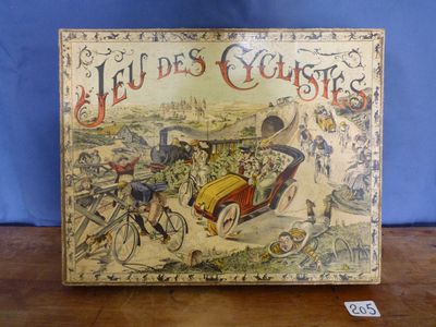 un vieux livre sur lequel figure l'image d'un homme à vélo