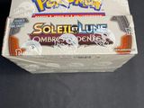 a close up of a box of pokemon cards on a table