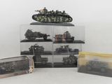 a lot of toy military vehicles in a display case