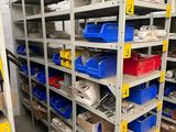 the shelves are filled with many different types of plastic bins