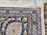 a close up of a rug with fringes on it