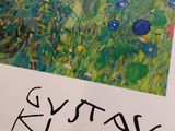 a picture of a painting on a table with a pen and paper