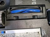 a close up view of a vacuum cleaner with a cord connected to it