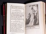 an open book with a picture of a woman on it