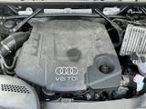 a picture of a car engine with the hood open