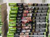 a lot of dvds stacked on top of each other