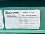 a label on the back of a green tractor