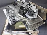 a pile of old photos on top of each other