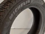 a close up of a tire on a white surface