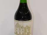 a bottle of wine that is sitting on a table