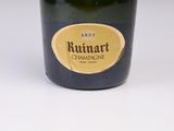 bottle of champagne on a white background with a brown label